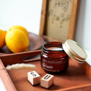 شمع شیشه قهوه ای کوچک